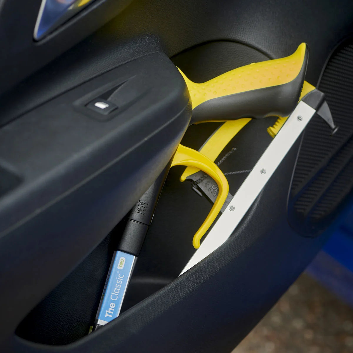 The Pro folder reacher in the side pocket of a door