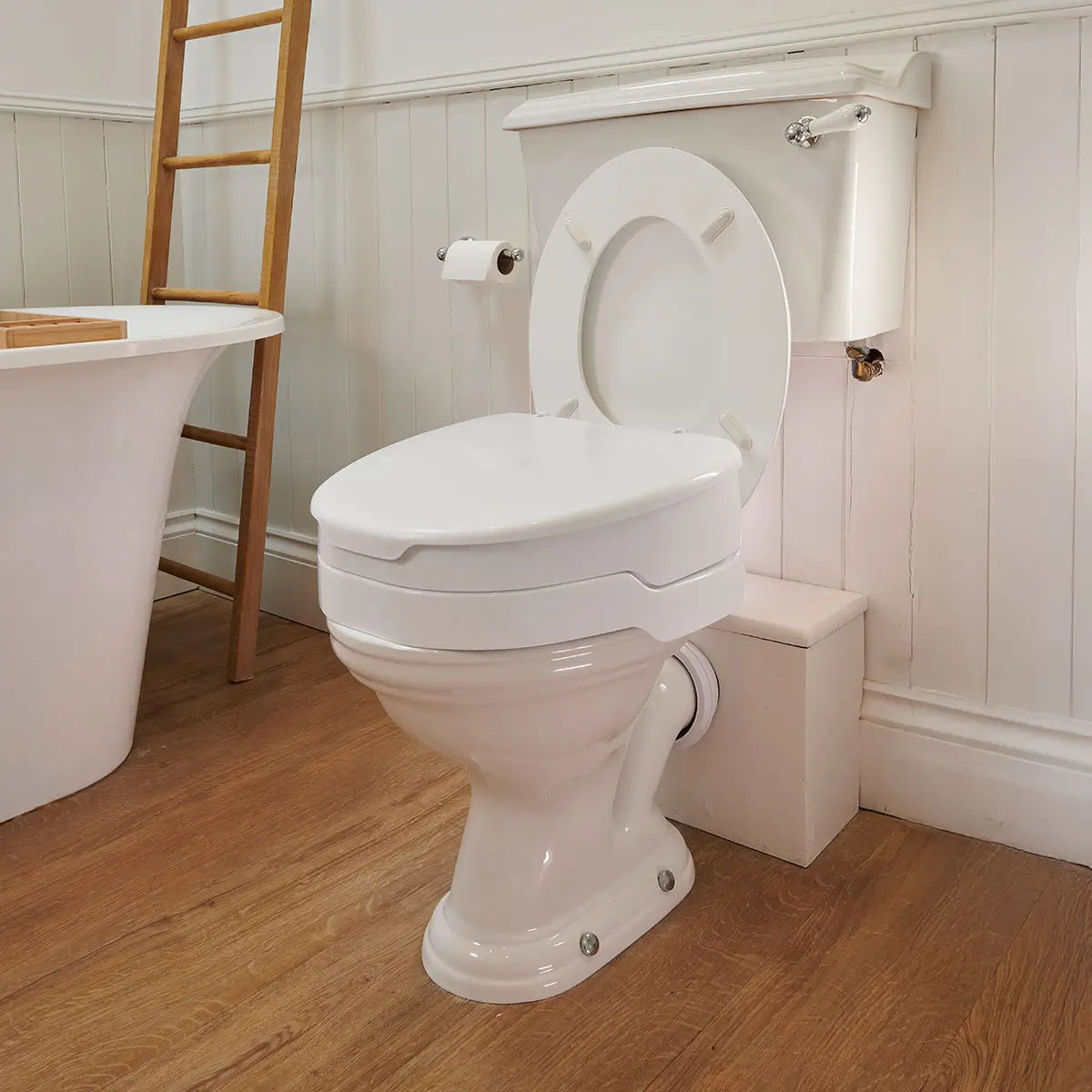 White Ezy Fit Raise Toilet Seat 4 inches with adjustable seat in a bathroom setting.