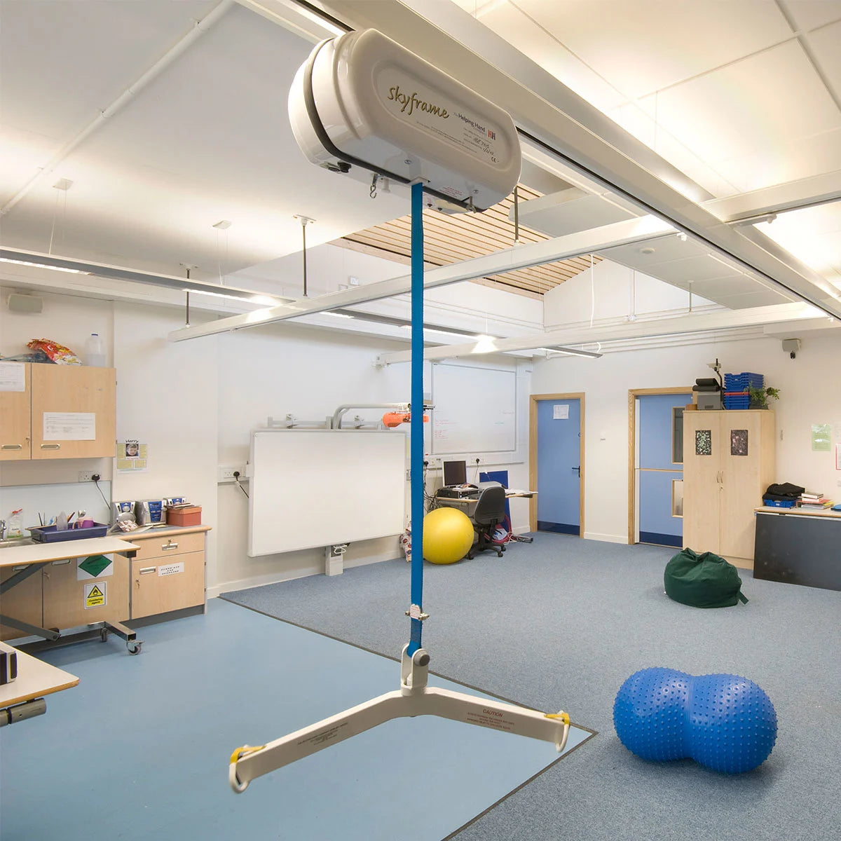 Skyframe ceiling hoist in a classroom setting.