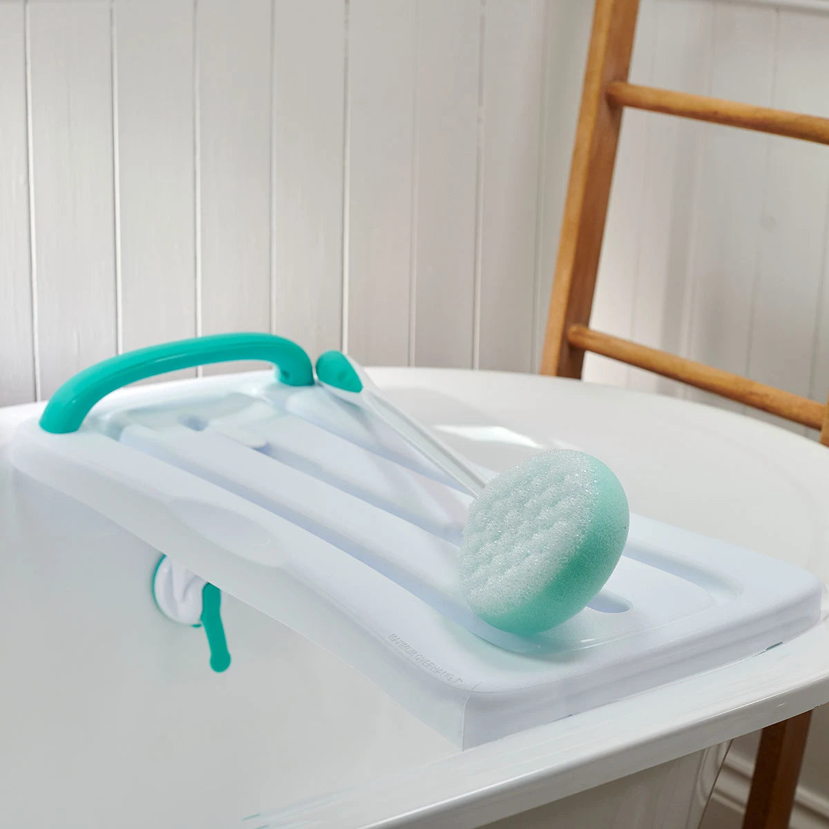 Surefoot Bathroom Kit with bath sponge and bath board.