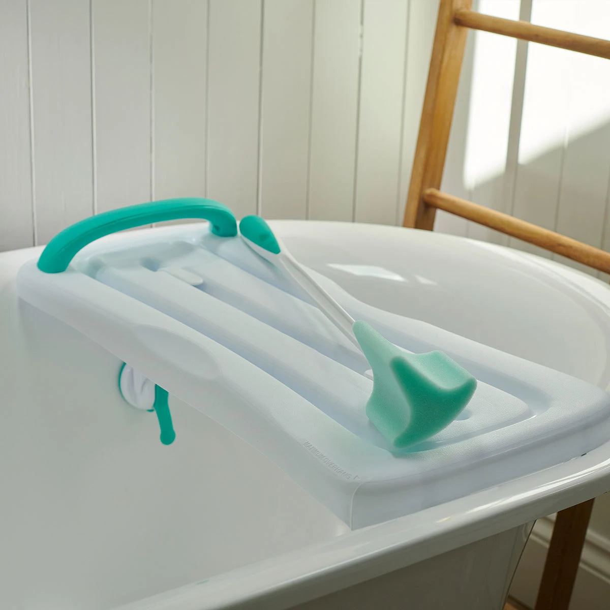 Surefoot Shower Kit with long handle sponge and bath board.