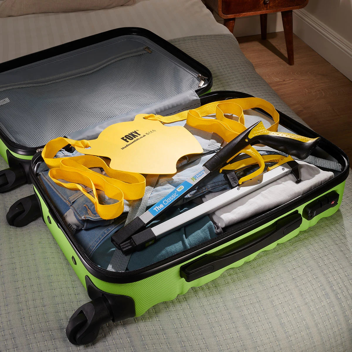 Portable Travel Kit with sock aids and Helping Hand grabber.