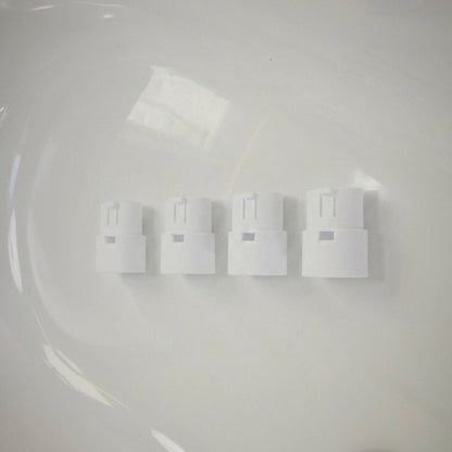 Set of white extension legs on a light grey background