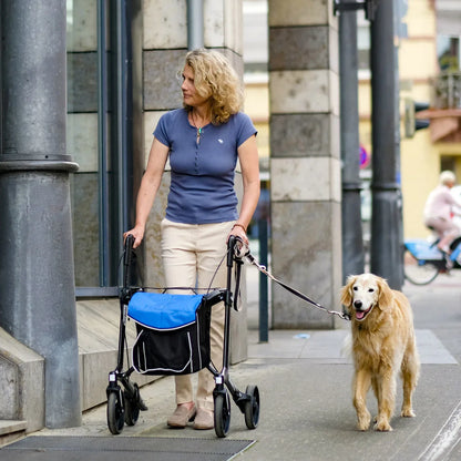 Woman walking dog with Gemino 30 Carbon walker.
